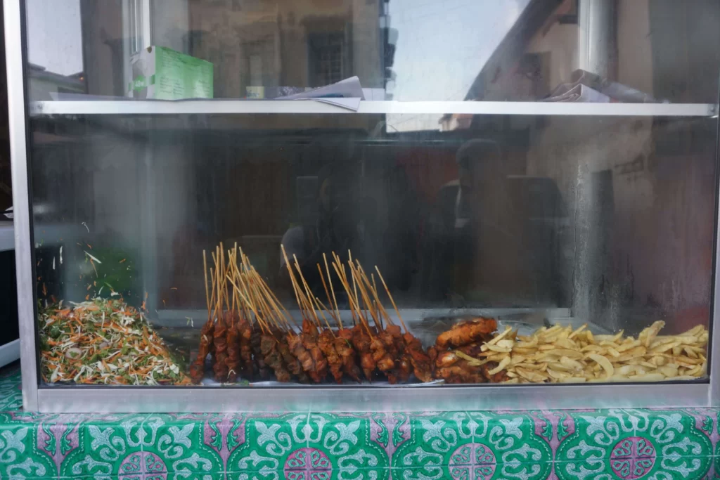 Fried chips and skewers on display in Zanzibar
