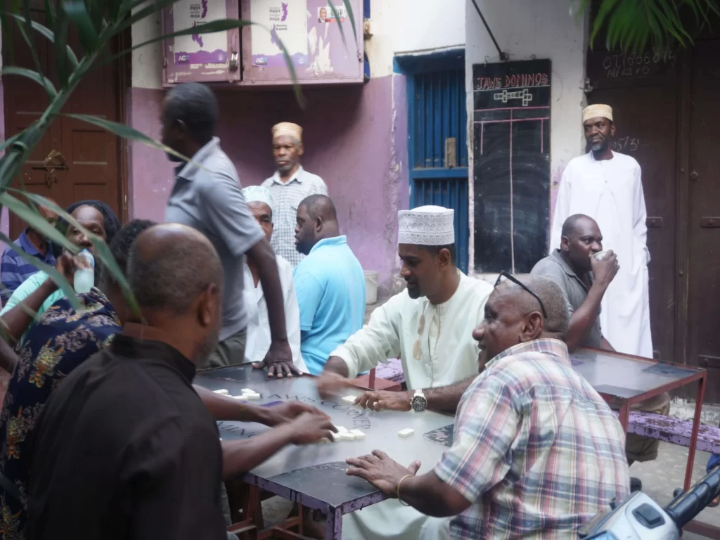 Locals playing a game of Dominos in Jaws Square, Stone Town