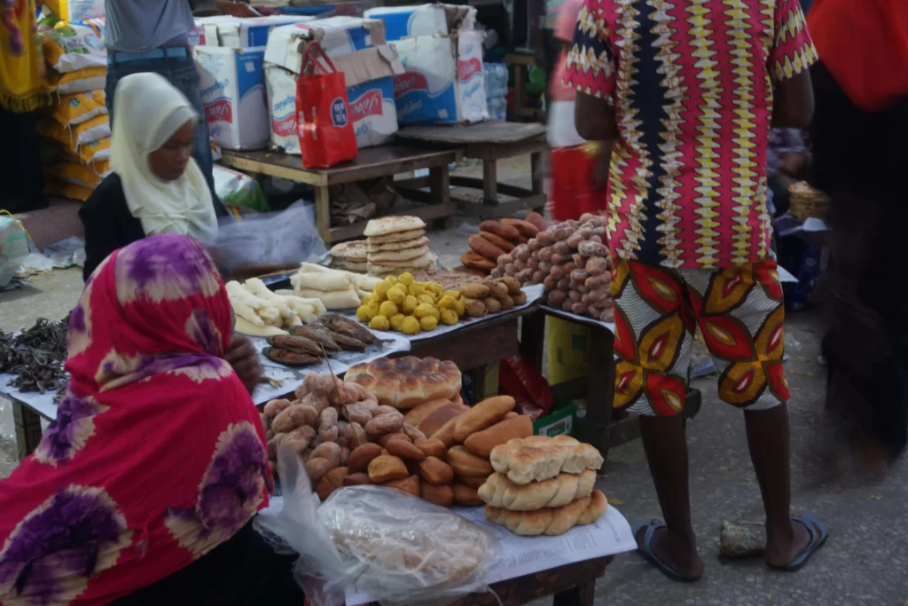 Women selling Mandazi in the market