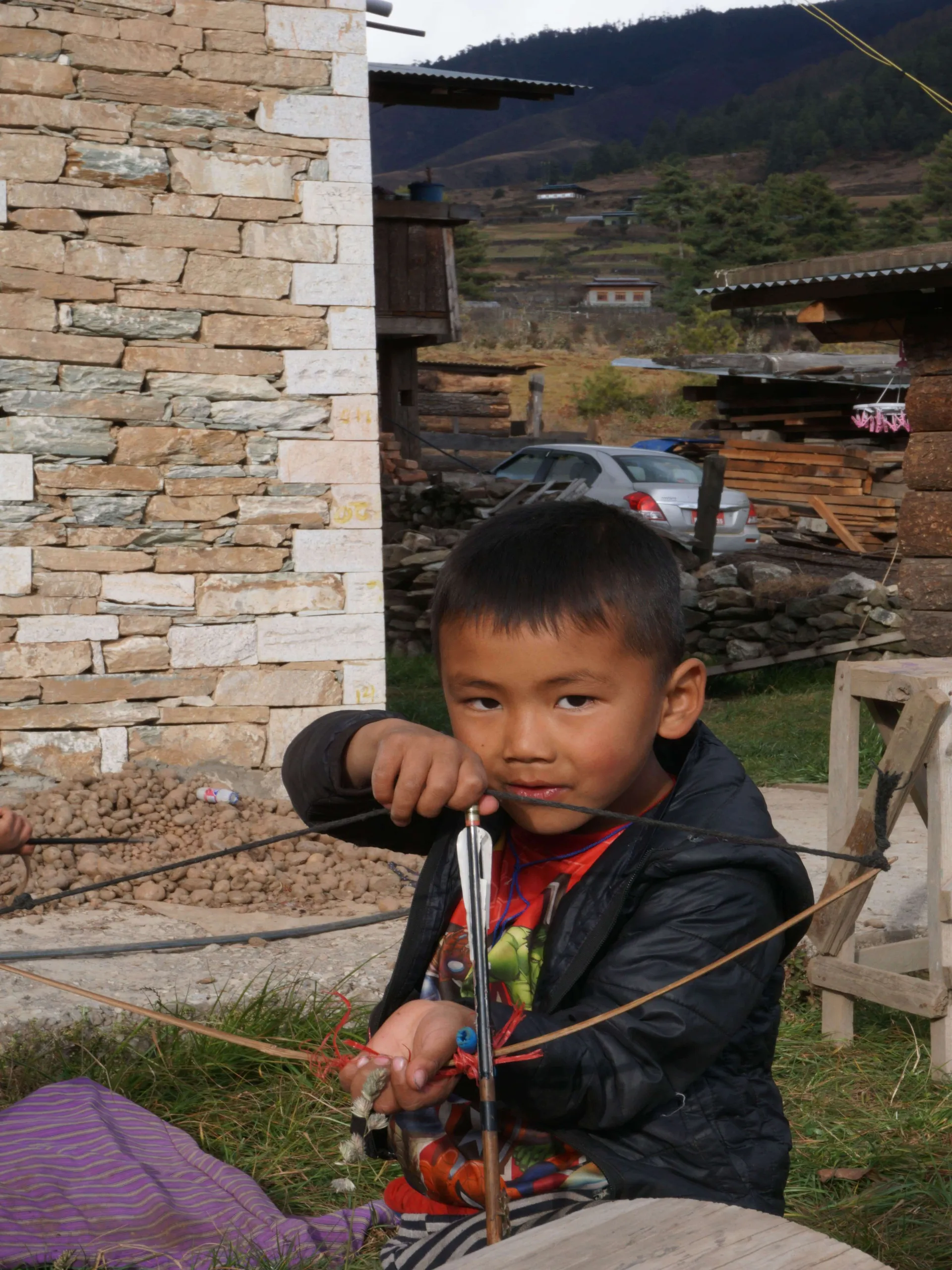 Kids playing archery in Bhutan